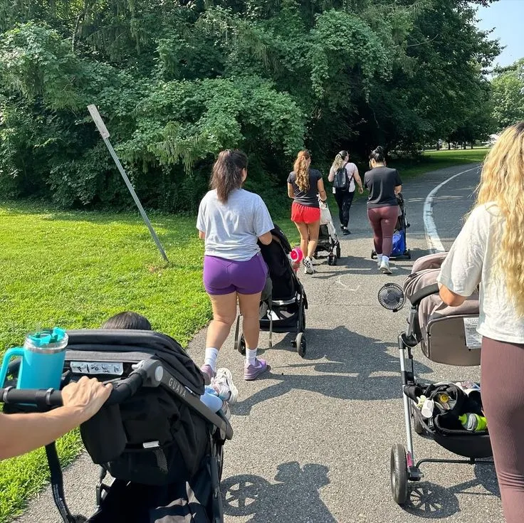 Members sharing stories at a walk meetup