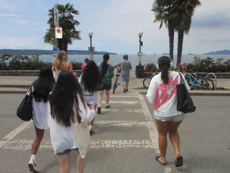 Group pausing on a shaded trail